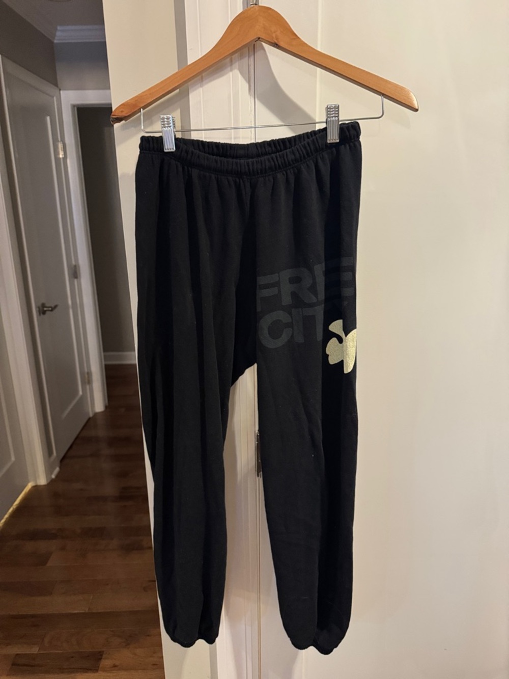 freecity Black Jogger Pants with Cream Clover Graphic